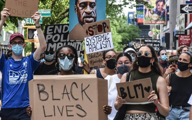 Crowd protesting the death of George Floyd amid disinformation and fake news